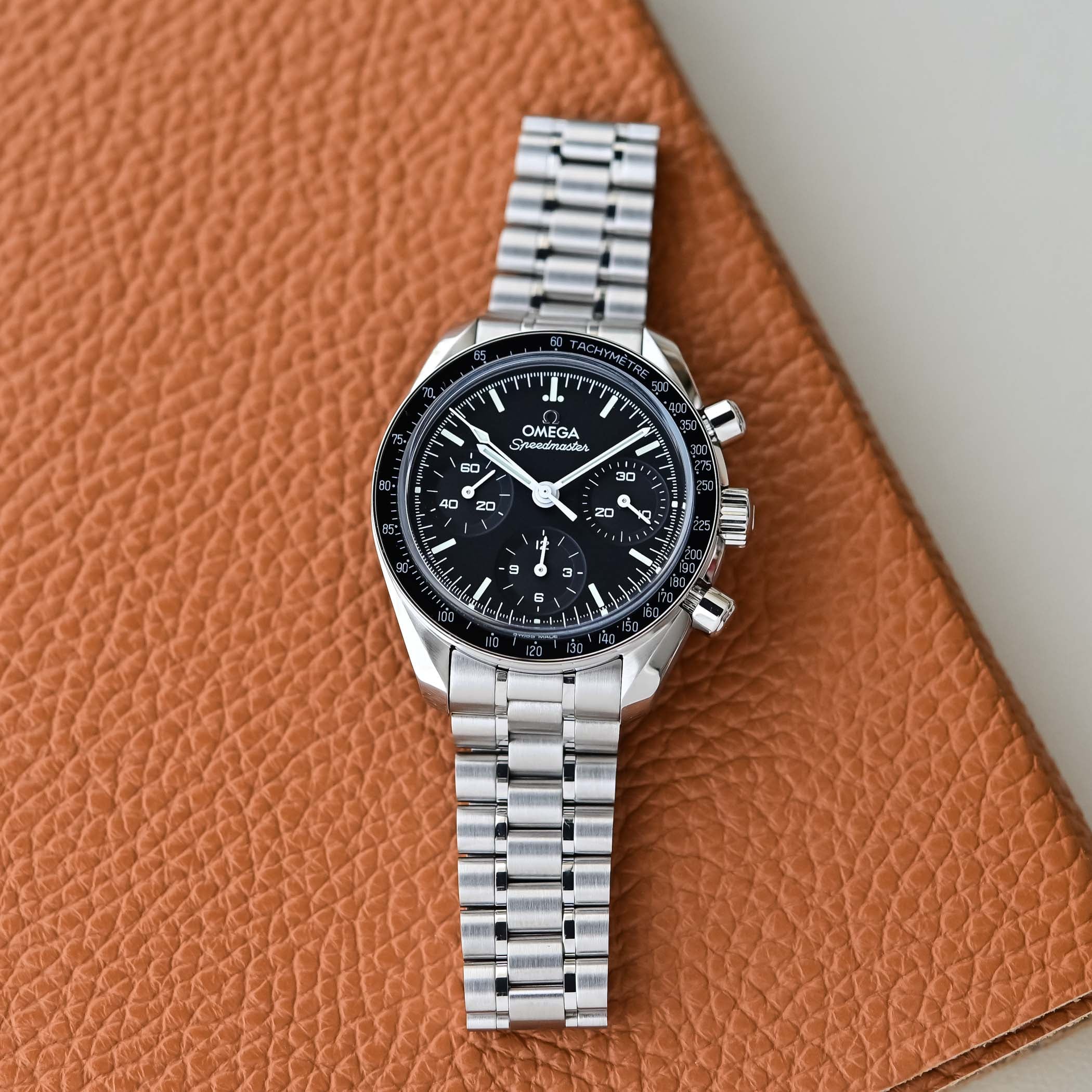 Omega Speedmaster 38 refresh with blue ceramic bezel and white lacquered dial reference 324.30.38.50.04.001